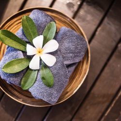 Welcome towels decorated with plumeria flowers